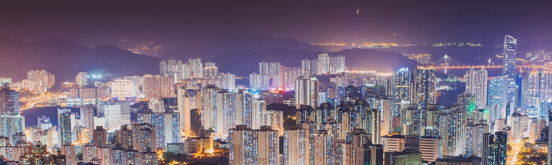 Photo of a lit up city at night